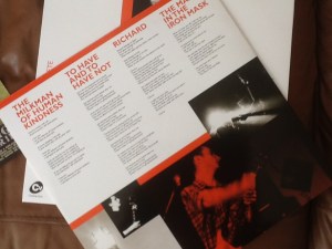 The other side of the lyric sheet.